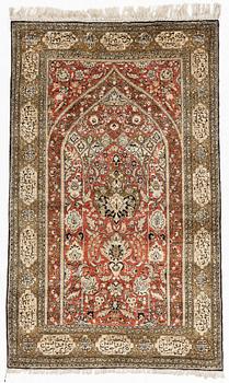 A rug, silk Quum, ca 174 x 103 cm.