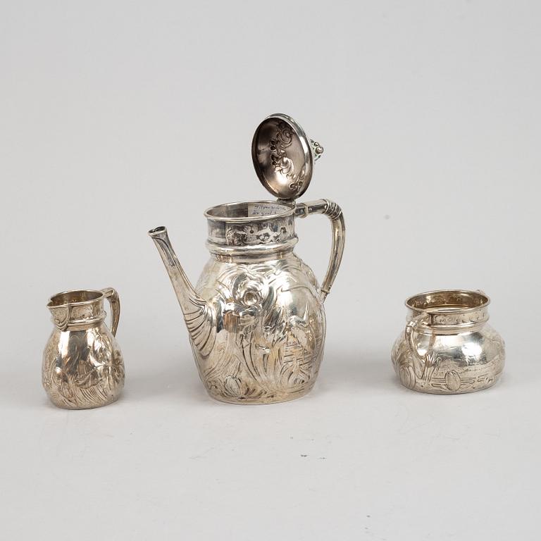 A Swedish silver coffee pot, creamer and sugar bowl, mark of Emil Oscar Möller, Malmö 1907.