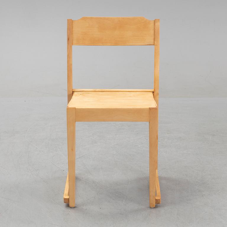 A set of five stackable birch chairs, mid 20th Century.