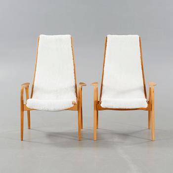 A pair of lounge chairs by Yngve Ekström for Swedese, second half of the 20th century.