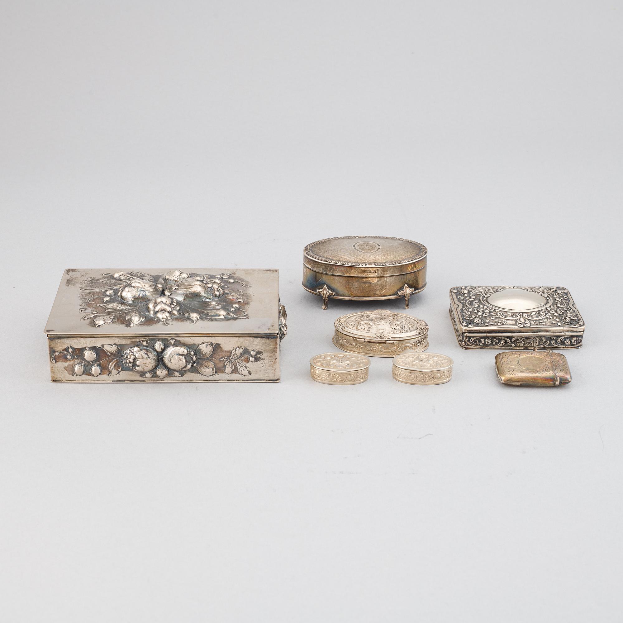 7 silver boxes.