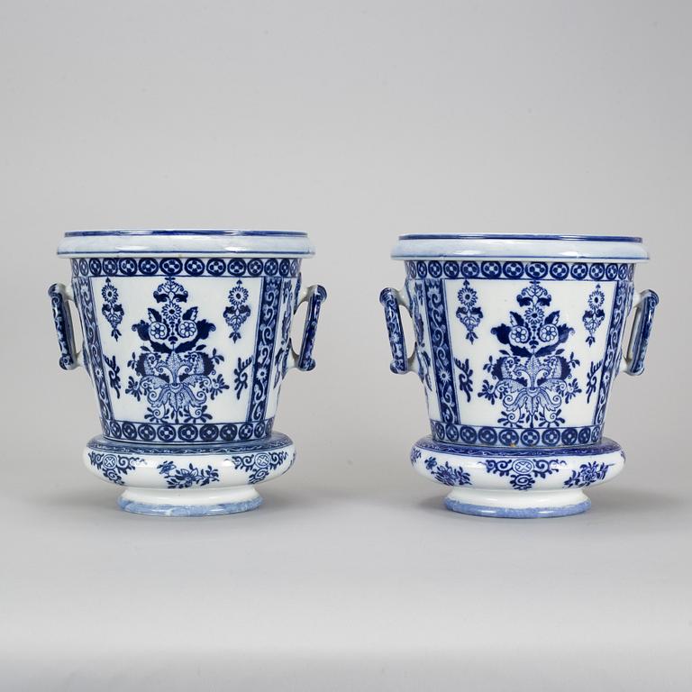 A pair of Petrus Regout & Co, Maastricht pots with bases, Delft, 20th century.