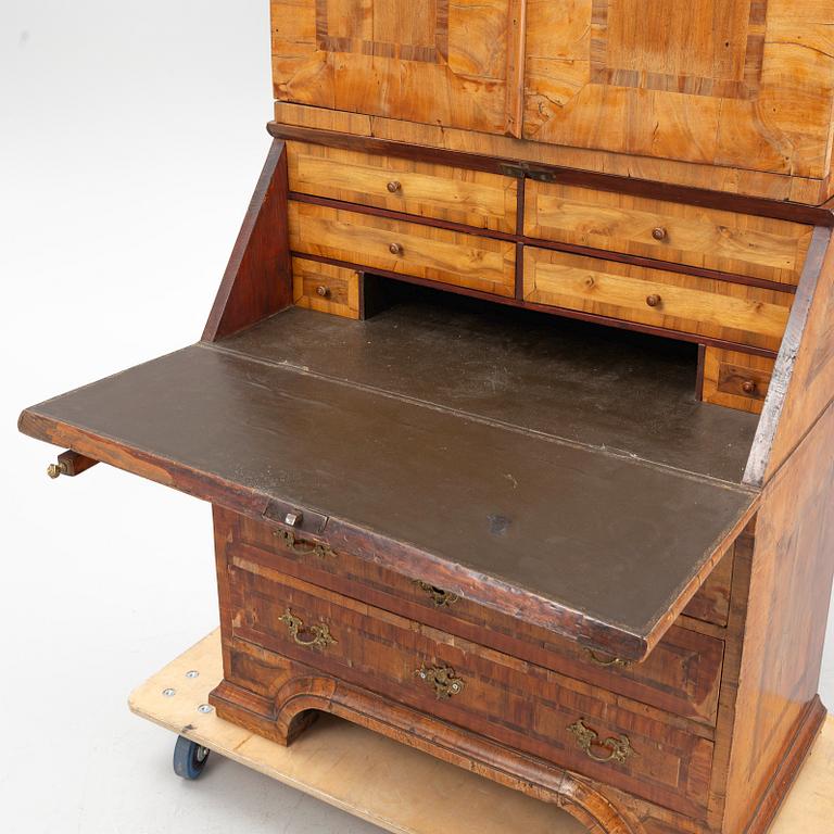 A Swedish late Baroque walnut marquetry writing cabinet.