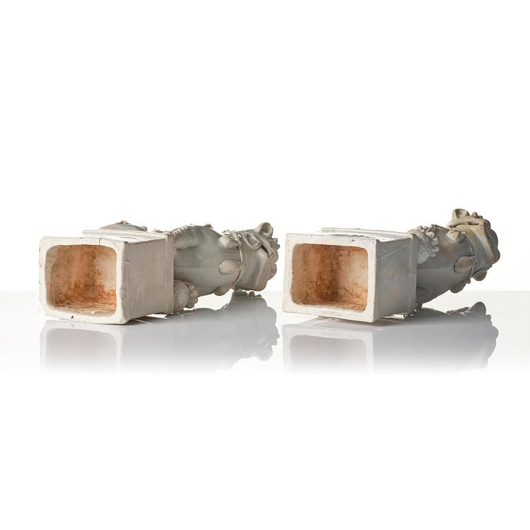 A pair of Chinese blanc de Chine 'Buddhist lion' joss stick holders, Qing dynasty, Kangxi (1662-1722).