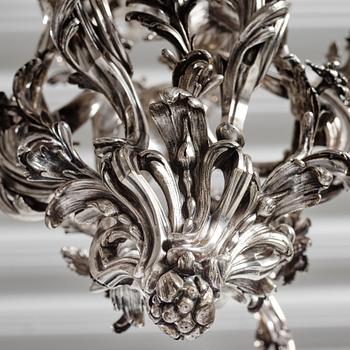 A highly important and rare Louis XV silvered brass
five-light chandelier  attributed to Pierre Boulanger, Paris c 1750.