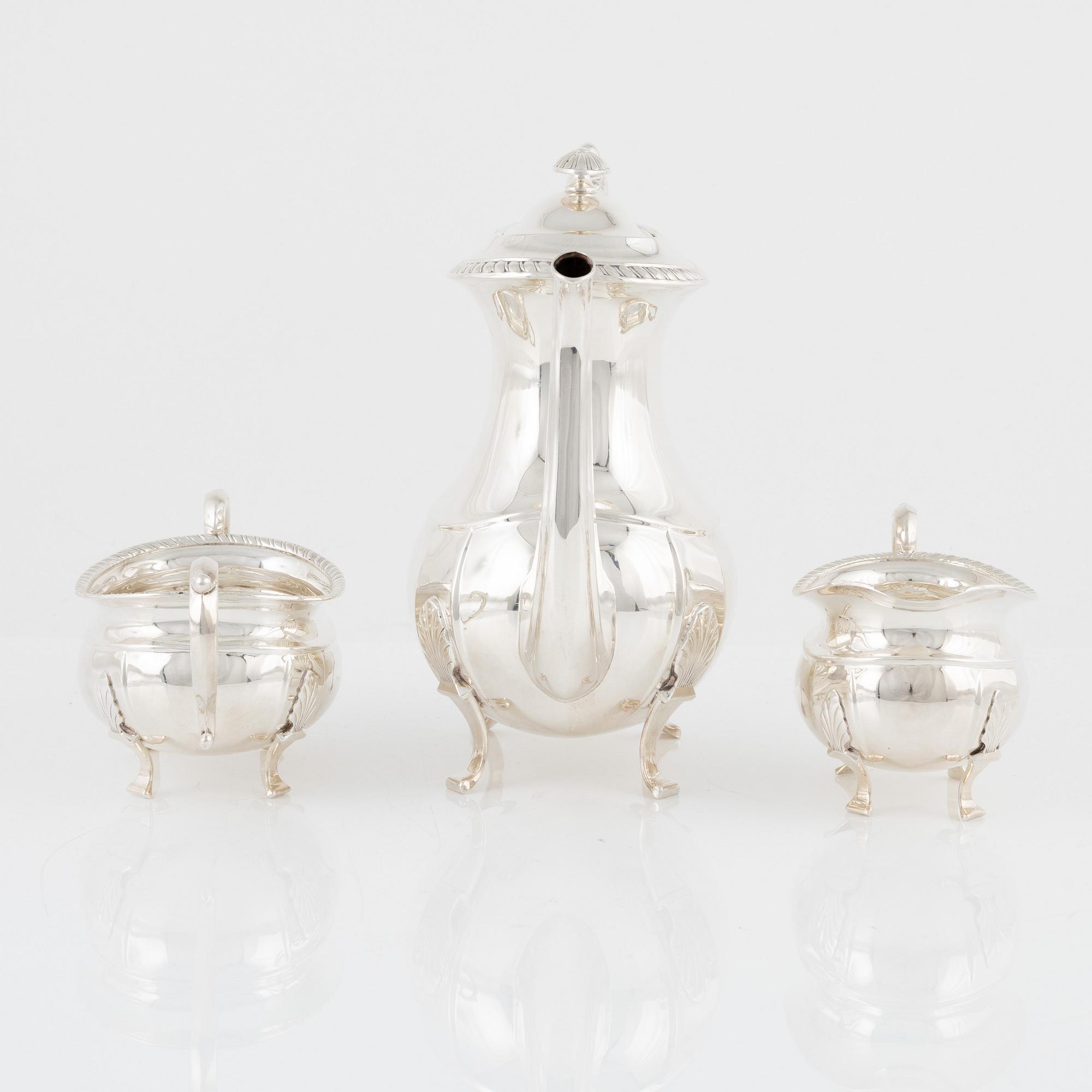 A Norwegian Silver Coffee Pot, Creamer and Sugar Bowl, mark of David Andersen, Oslo, mid-20th Century.
