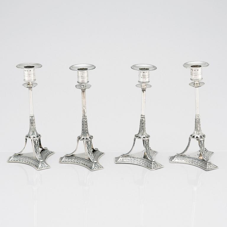 Four Swedish early 19th Century silver candlesticks, mark of Adolf Zethelius, Stockholm 1814 and 1818.