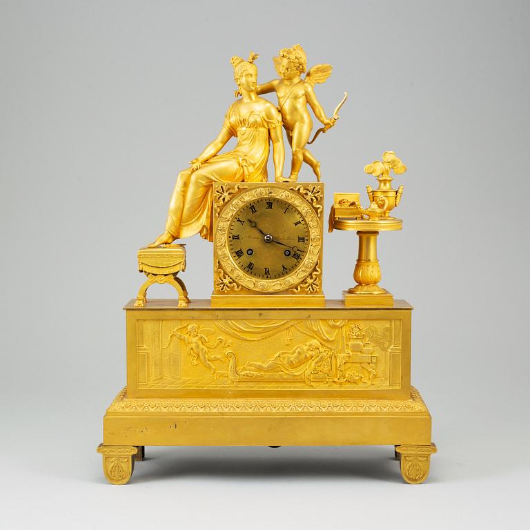 A French Empire pendulum clock, early 19th century.