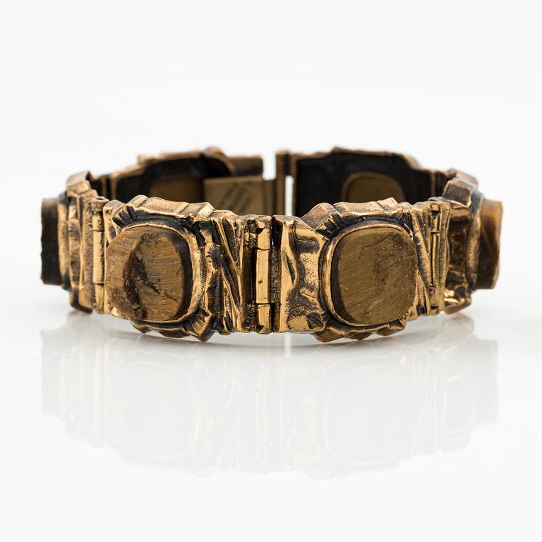 Pentti Sarpaneva, armband och ring, brons och tigeröga.