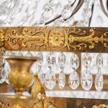 An ormolu and cut glass sixteen-branch Empire chandelier, Paris, early 19th century.