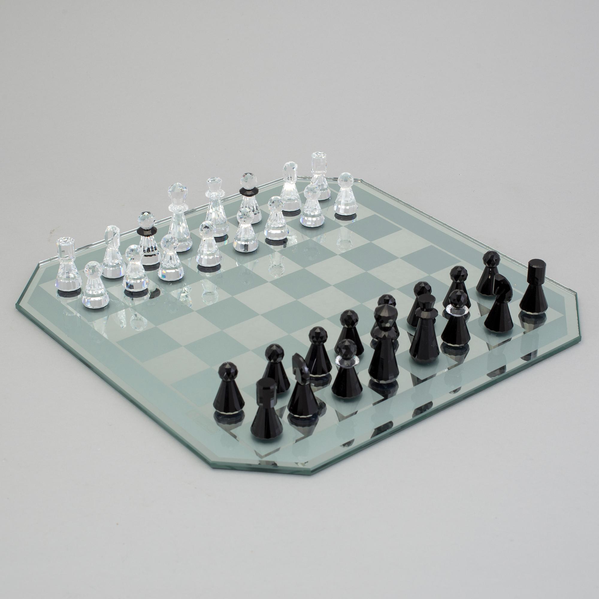 A SWAROVSKI CHESS SET.