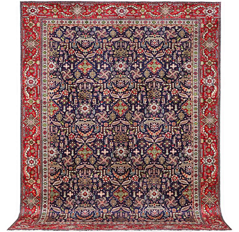 A Tabriz carpet, c. 369 x 277 cm.