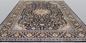 A Kashmar carpet, ca 340 x 253 cm.