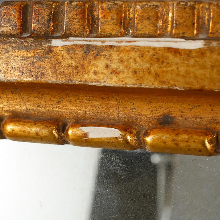 A mirror in gustavian style, made around year 1900.