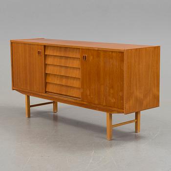 A 1960´s sideboard venereed in teak.