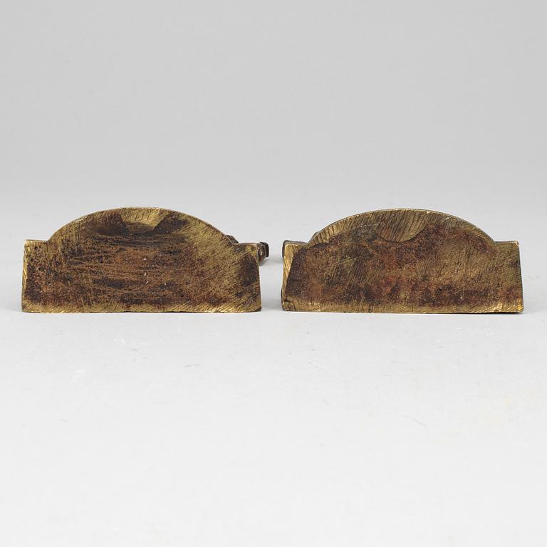 A pair of bronze 20th century book ends.