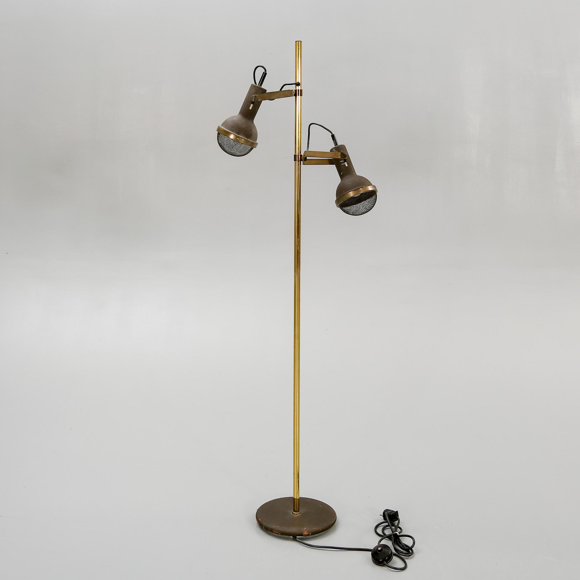 A late 20th century brass floor lamp.