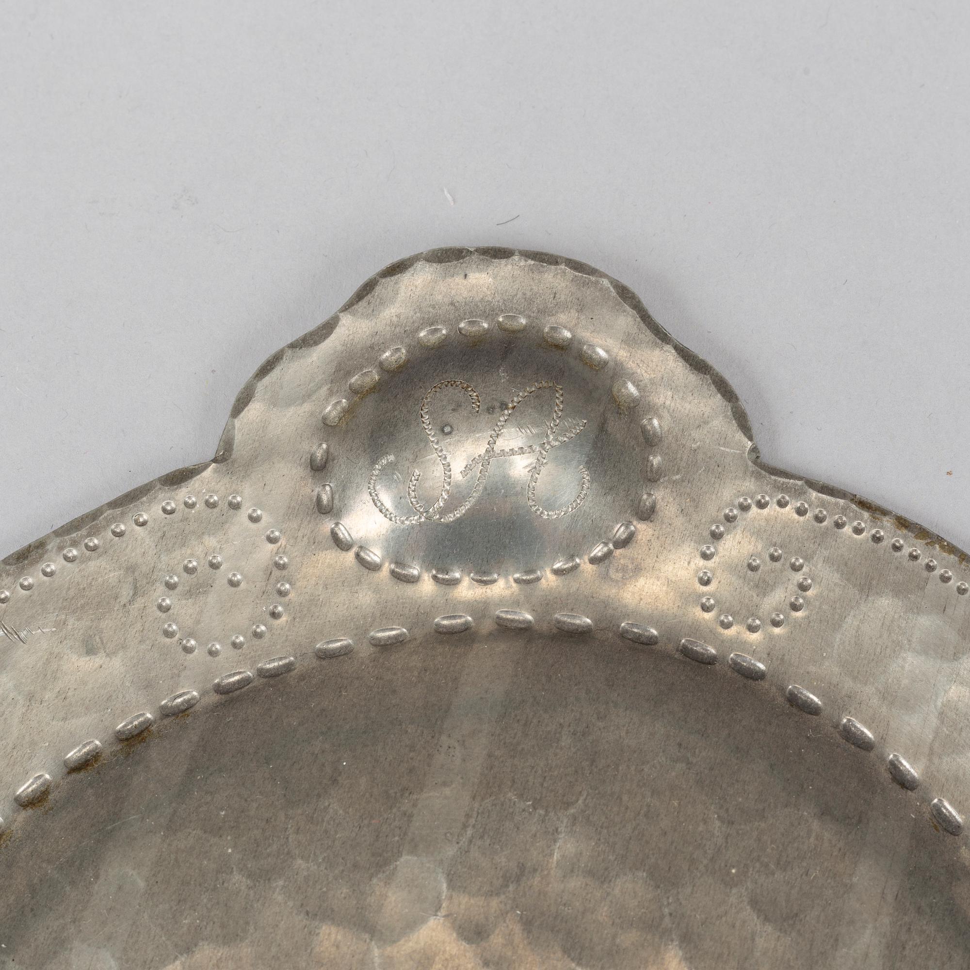 A pair of pewter wall sconces, K Wiholm, Stockholm 1925.