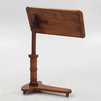 A reading table, J. Carter London, England, circa 1900.