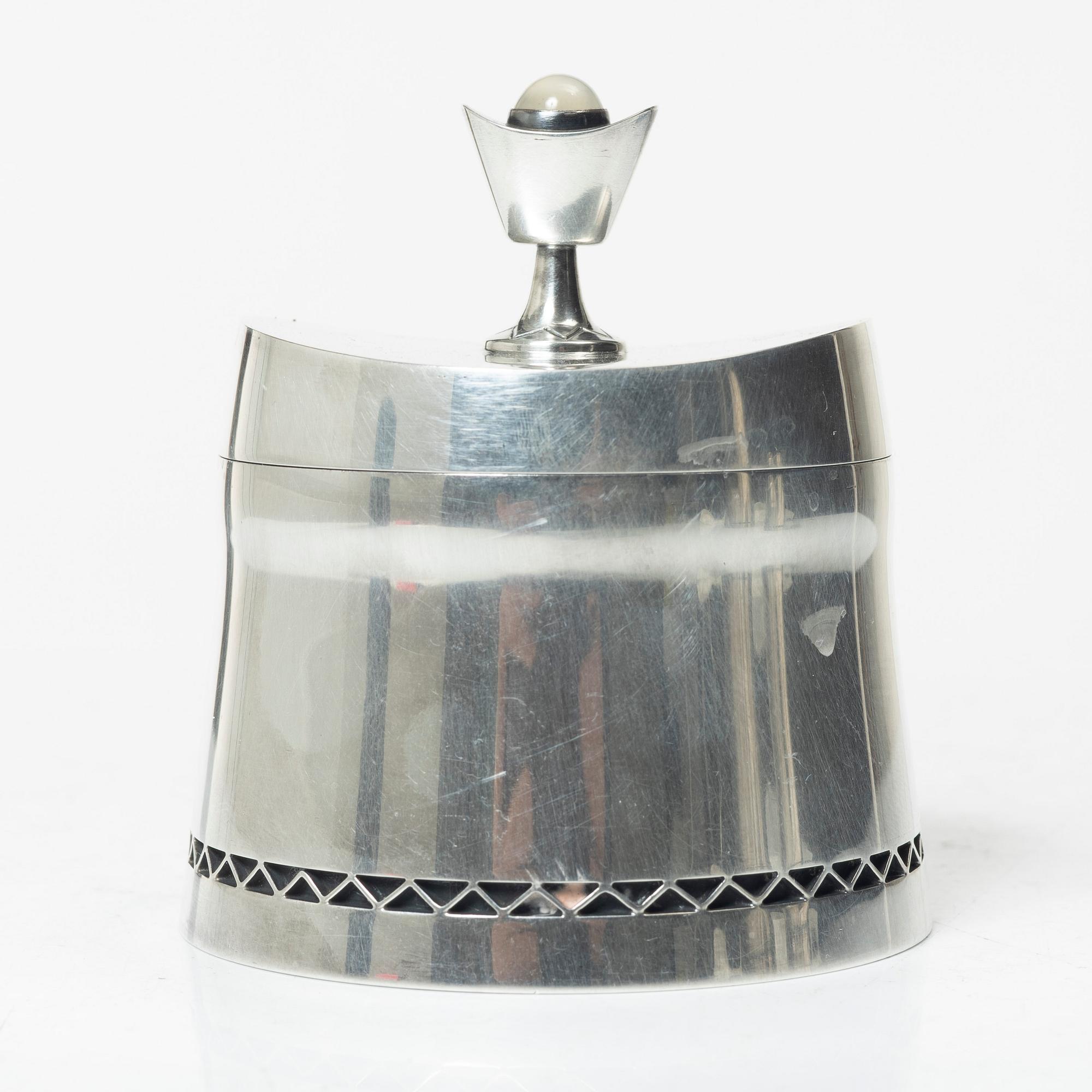 A three-piece silver coffee service by Helge Lindgren for K. Andersson, Stockholm, 1958.