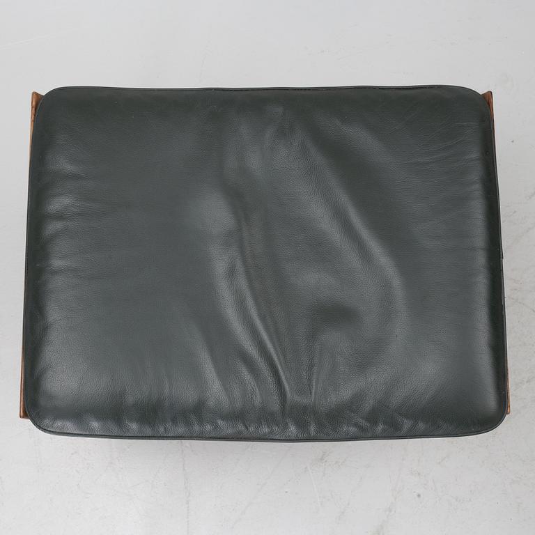 Finn Juhl, a 'Bwana' armchair and ottoman, France & Son, Denmark, 1960's.