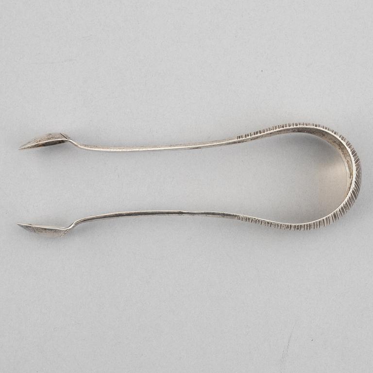 Three silver tongs, Sweden and Denmark, 1834-1923.