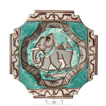 76. Allan Ebeling, a large glazed ceramic plate, Upsala-Ekeby 1930.