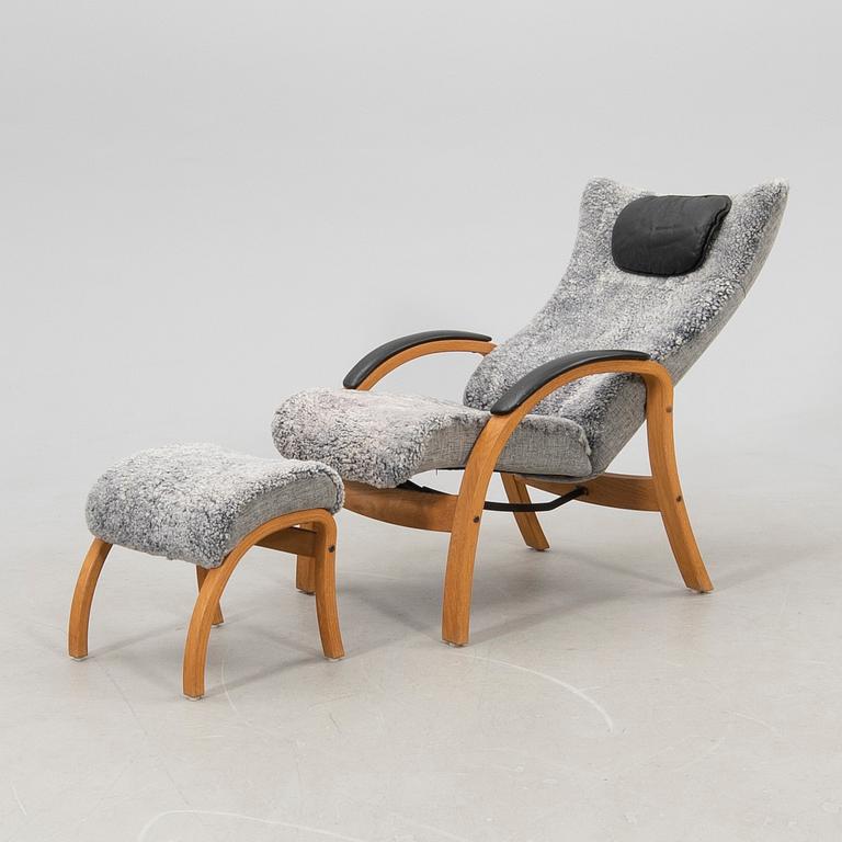 Jahn Aamodt armchair with footstool "Easy" for Conform, 21st century.
