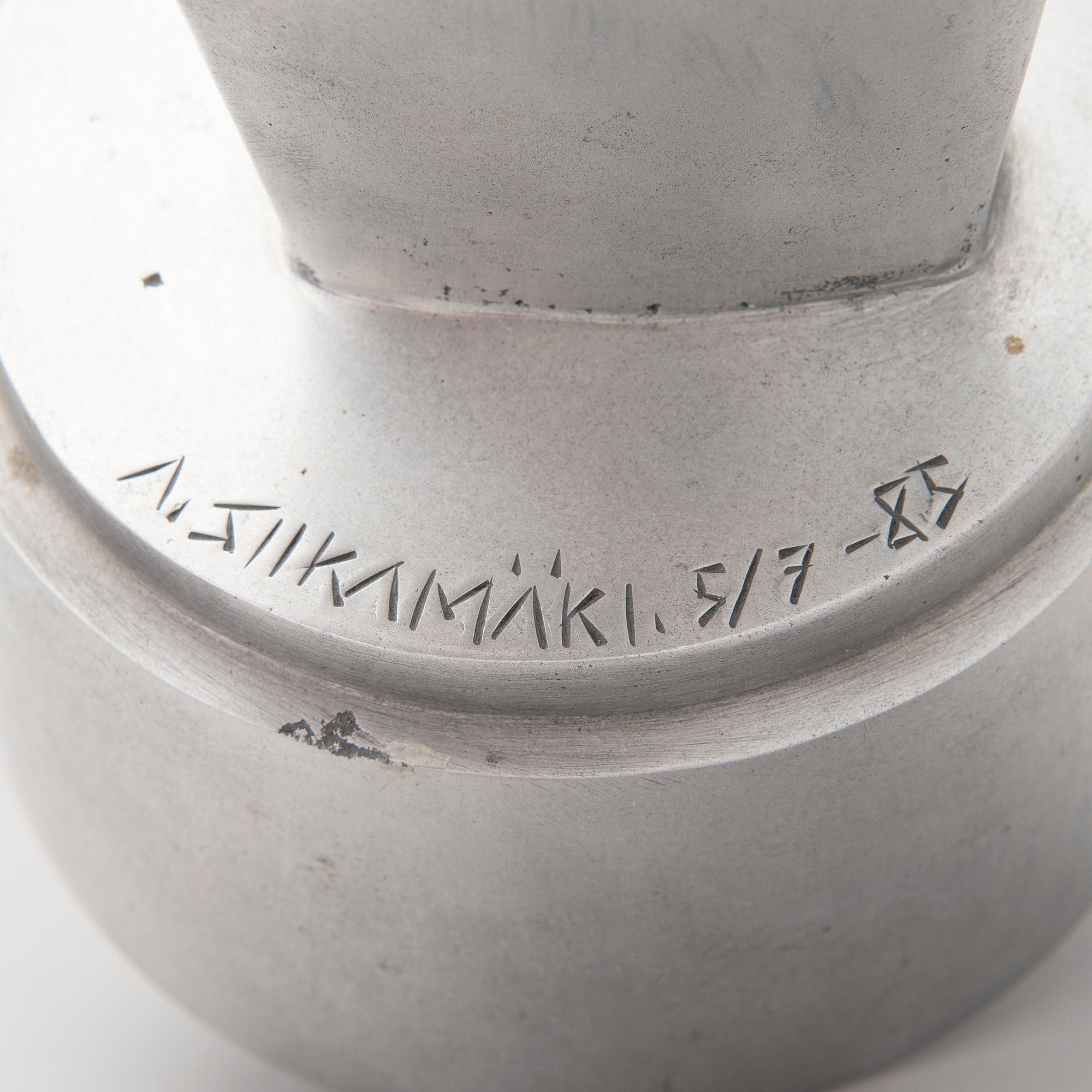 An aluminium sculpture, signed and numbered 5/7, dated -85.