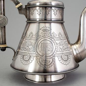 A Russian 19th century parcel-gilt tea-pot, mark of Nicolai Kemper, St. Petersburg 1882.