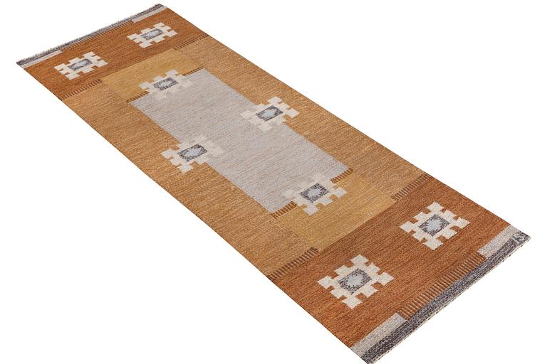 Ingegerd Silow, a runner carpet, flat weave, Sweden, signed IS, c. 253 x 83 cm.