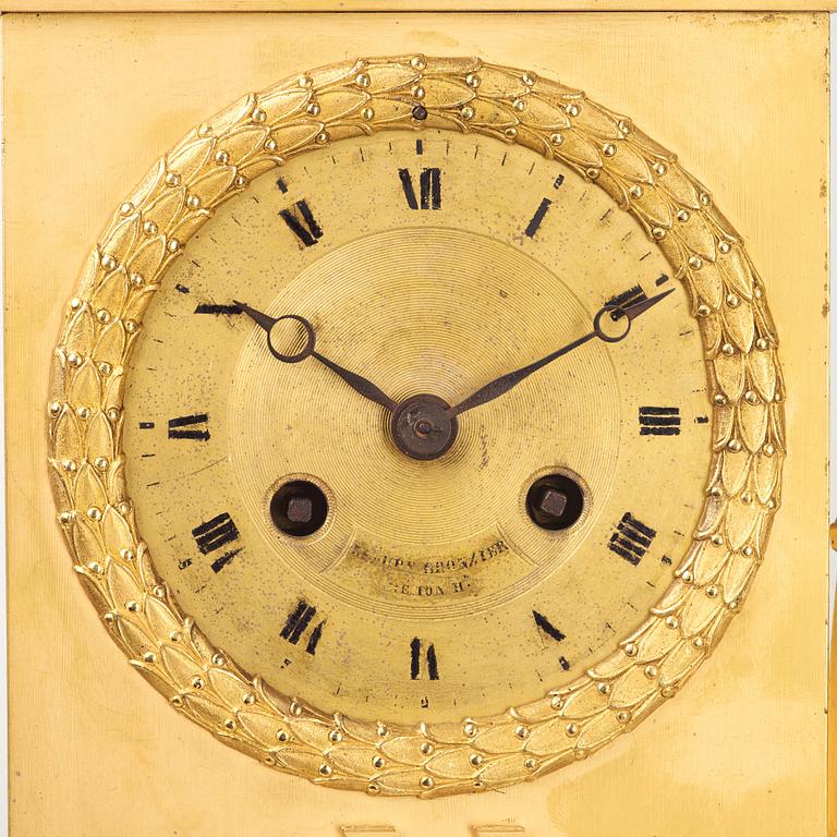 A French Empire mantel clock by Ledure and Remond, active in Paris 1812-20.