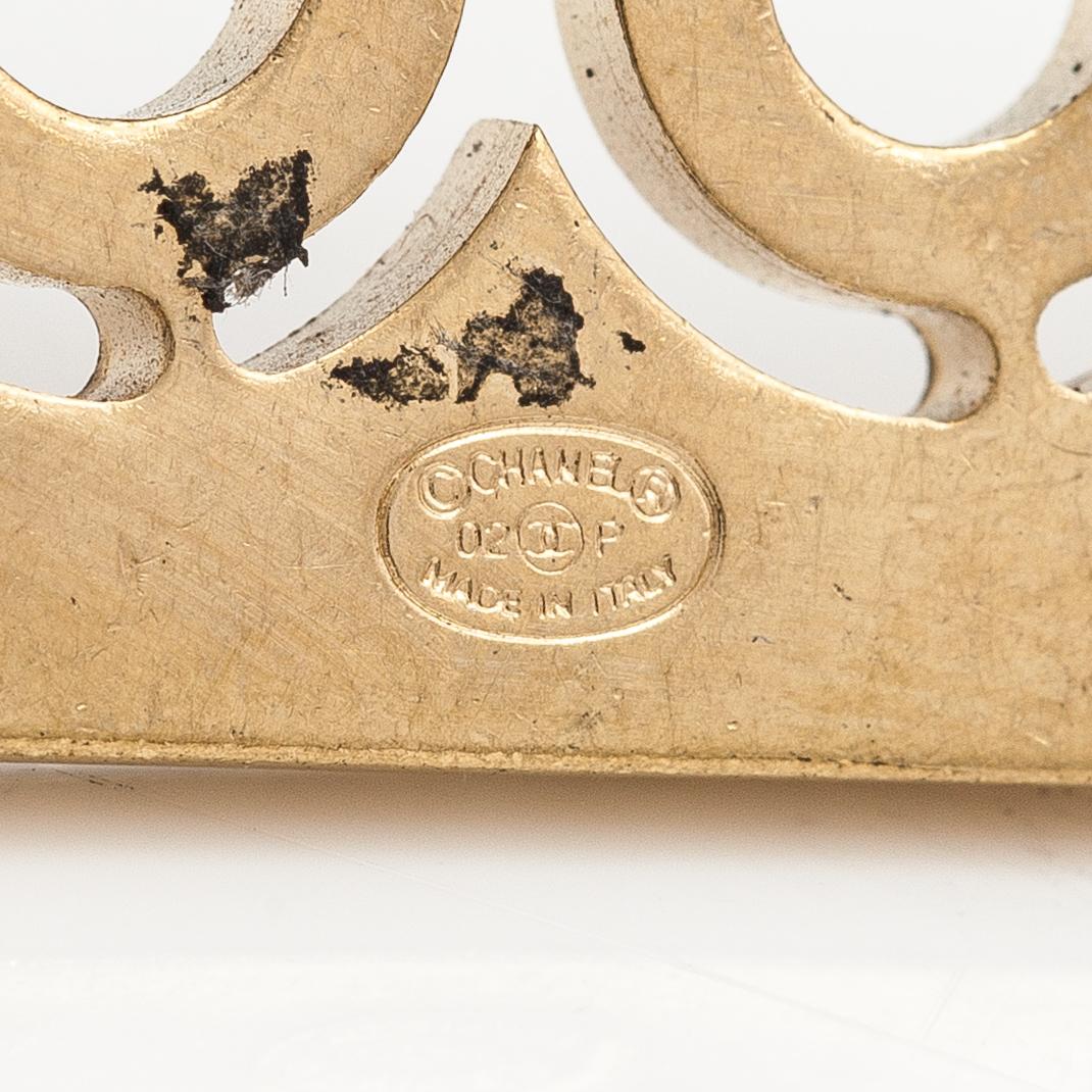 Chanel, A gold coloured metal chain belt with pink stones. Marked "CHANEL 02 CC P MADE IN ITALY".