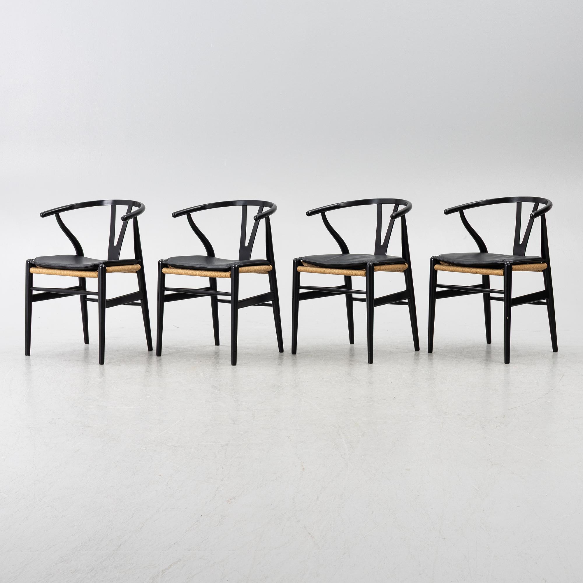 Hans J. Wegner, four CH24/ "Wishbone" chairs, Carl Hansen & Son, Denmark, 21st century.