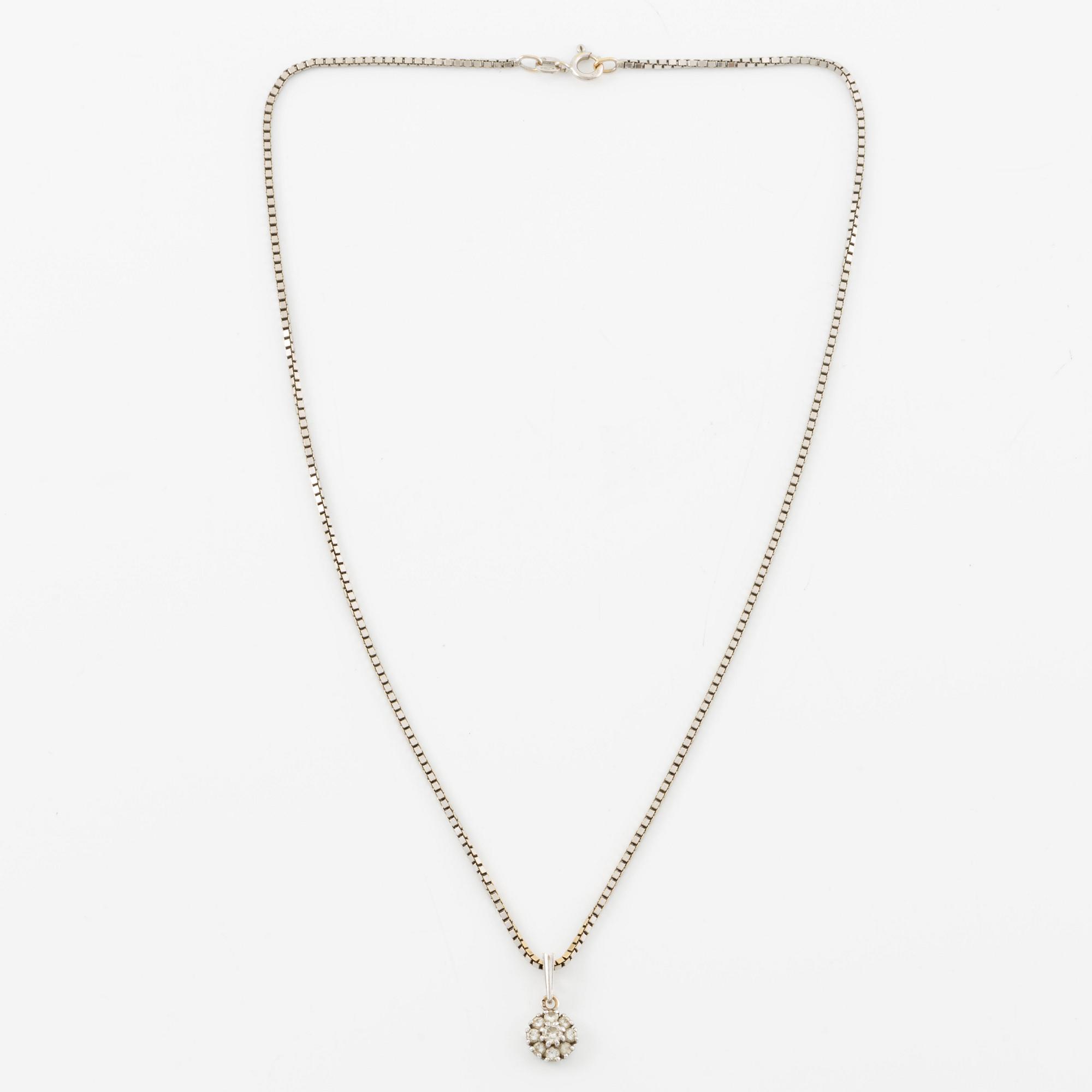 Pendant, 18K white gold set with brilliant-cut diamonds, and chain.