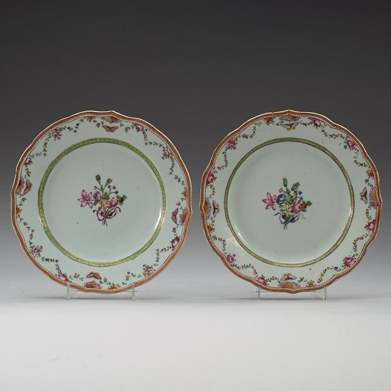 A famille rose serving dish and two dinner plates, Qing dynasty, Qianlong (1736-95).