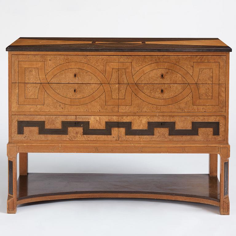 Carl Bergsten, an oak veneered sideboard/ chest of drawers, Nordiska Kompaniet Sweden 1923. Part of a set exhibited in Gothenburg 1923.