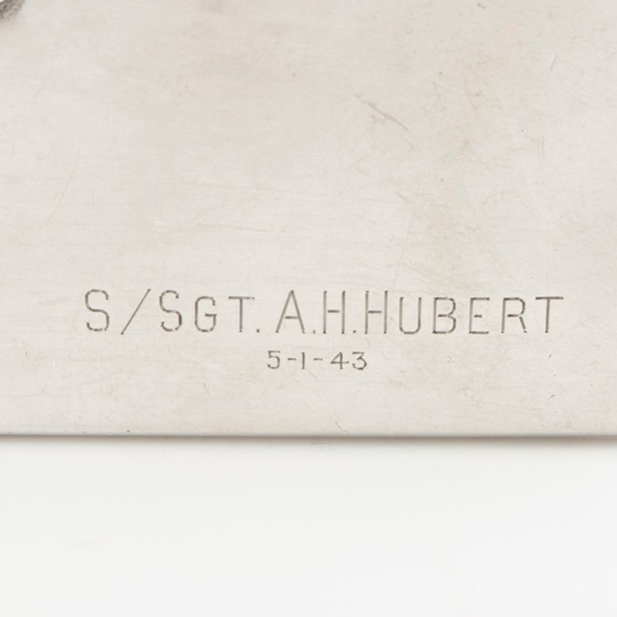 American silver cigarette case with engraving from World War II.
