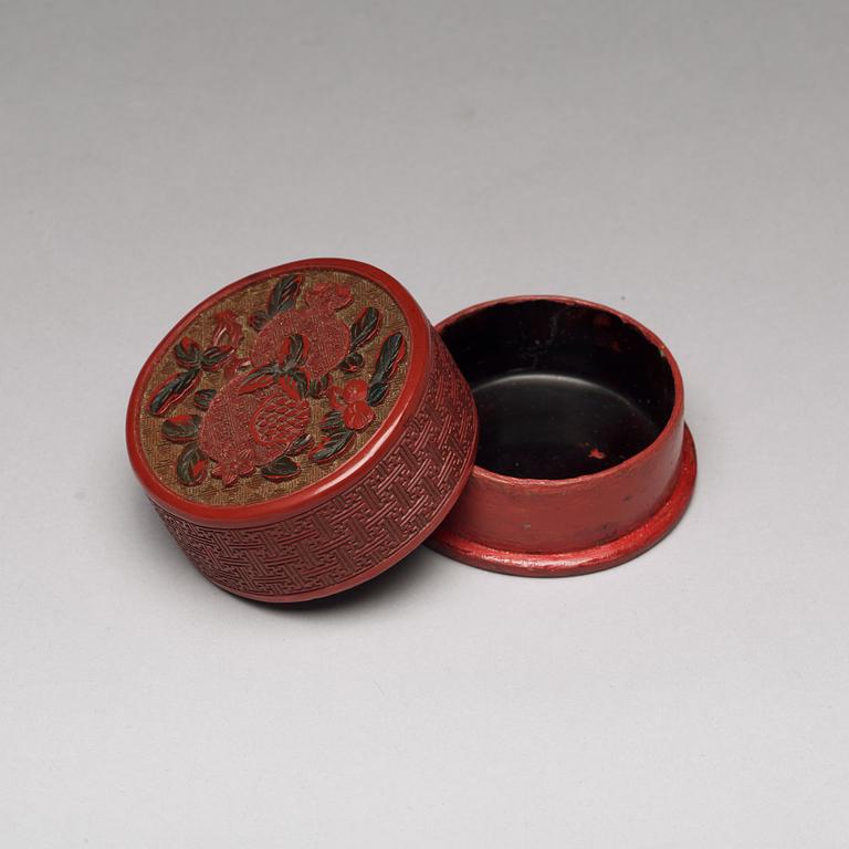 A Chinese lacquered box with cover, late Ming/early Qing, and a Japanese lacquered inro, Meiji period (1892-1912).