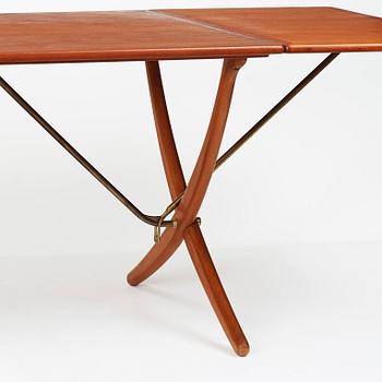 Hans J. Wegner, a teak, beech and brass dining table model "AT-314", for Andreas Tuck, Denmark 1950-60's.