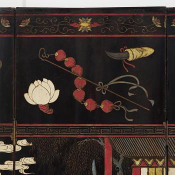 A Chinese four panel lacquer folding screen, first part of the 20th century.