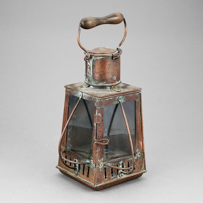 LANTERNA, koppar, J.C Larsén & Co, Österlånggatan 43,  1900-talets första hälft.