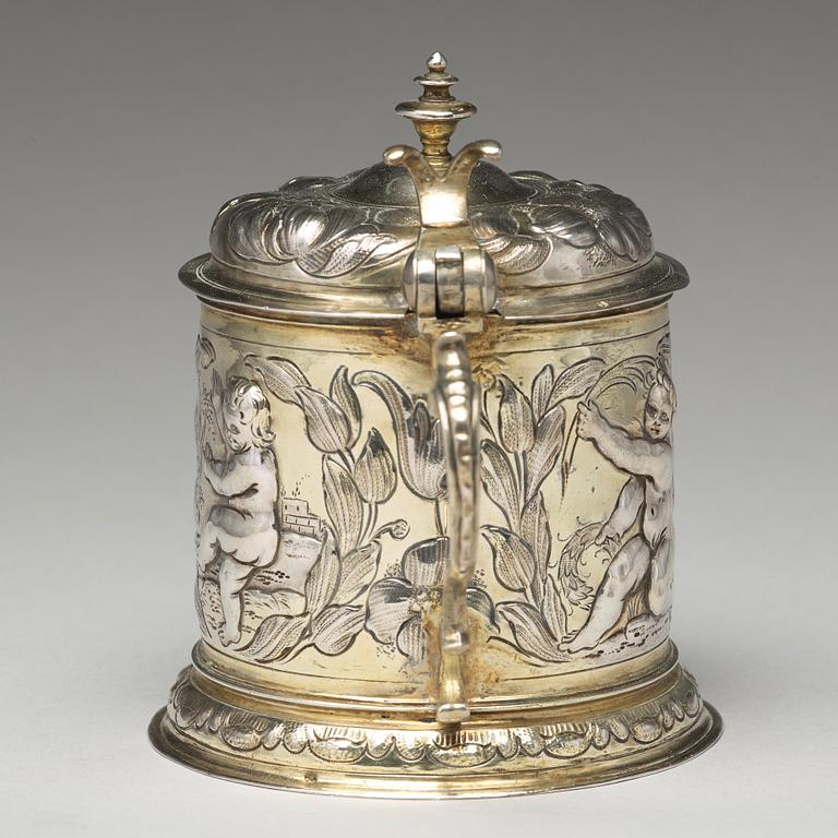 A German 17th century parcel-gilt silver tankard, mark of Hans Leonhard Huber, Augsburg (1637-1671).