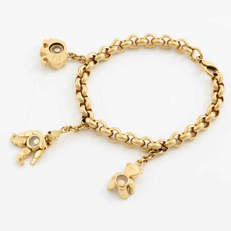 Chopard armband med berlocker 18K guld med runda briljantslipade diamanter.