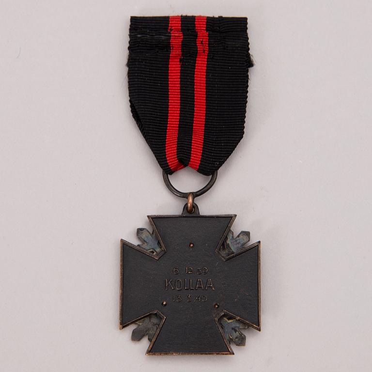 A mid 20th Century Finnish Kollaa commemorative cross.