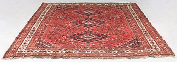 A oriental  carpet. Ca 220x320 cm.