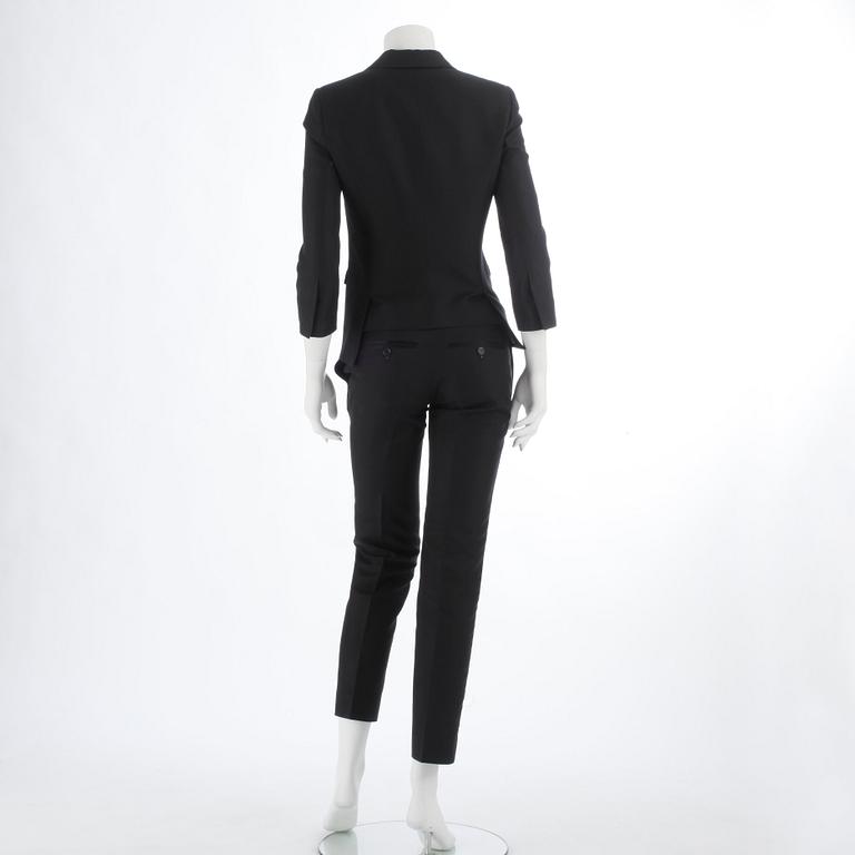 DSQUARED, a black cotton and silk two-piece suit consisting of jacket and pants. Size 42.
