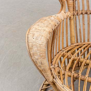 a rattan chair by Gio Ponti & Lio Carminati, Italy, second half of the 20th century.