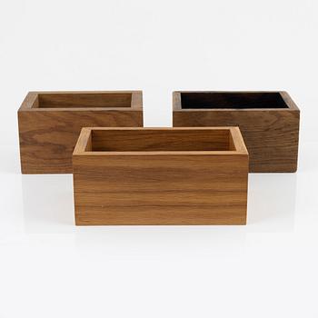 Magnus Ek, three oak wood cutlery boxes for Oaxen Krog.