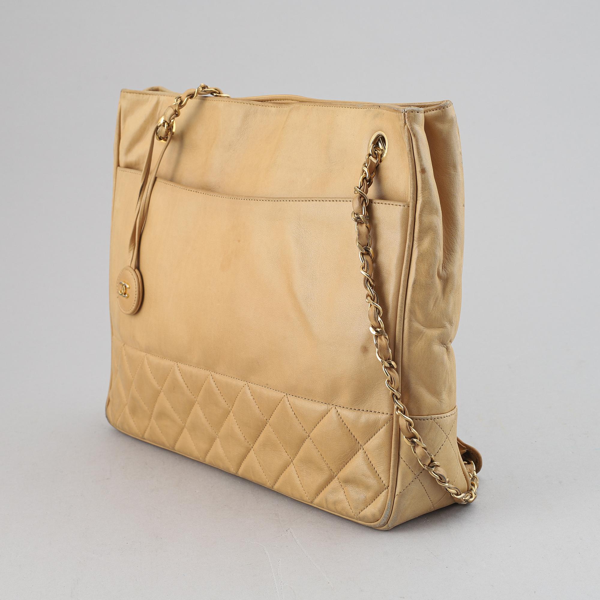 Chanel, a beige leather handbag, 1986-1988.